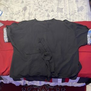 Black with sequins sleeves,very nice for date night.